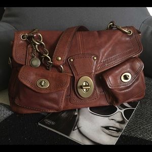 Leigh leather pocket shoulder bag. 14L x 9H x 5W